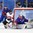 GANGNEUNG, SOUTH KOREA - FEBRUARY 17: Switzerland's Denis Hollenstein #70 is knocked in the goal post by Korea's Young Jun Lee #13 while Matt Dalton #1 holds his position during preliminary round action at the PyeongChang 2018 Olympic Winter Games. (Photo by Andre Ringuette/HHOF-IIHF Images)

